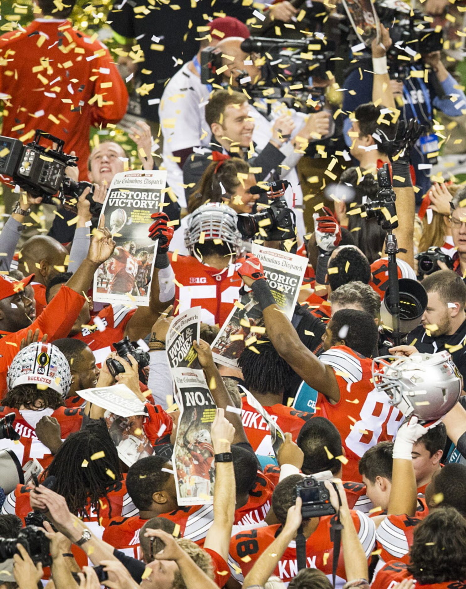 Ohio State players celebrate after a victory over the Oregon Ducks in the College Football...