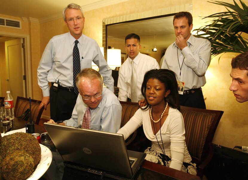 Democratic gubernatorial candidate Chris Bell (left), Fred Ellis (sitting left), finance...