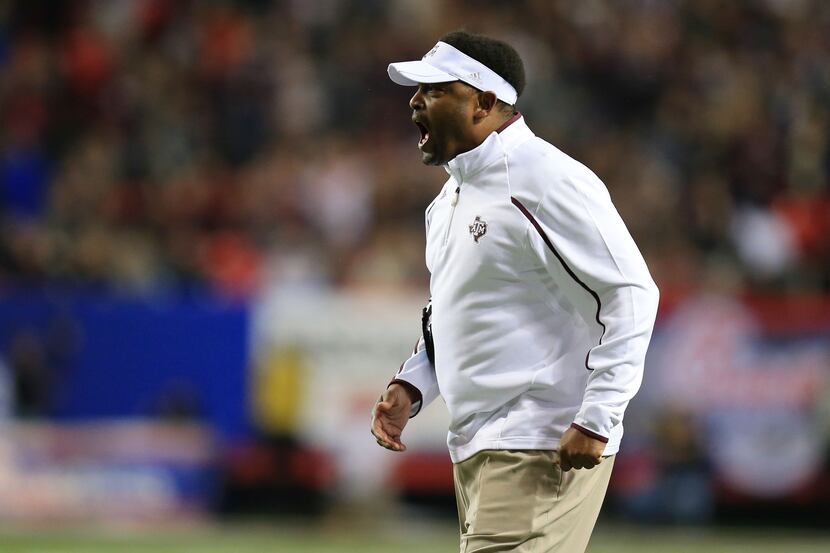 Texas A&M Aggies head coach Kevin Sumlin questions a call with an official during the first...