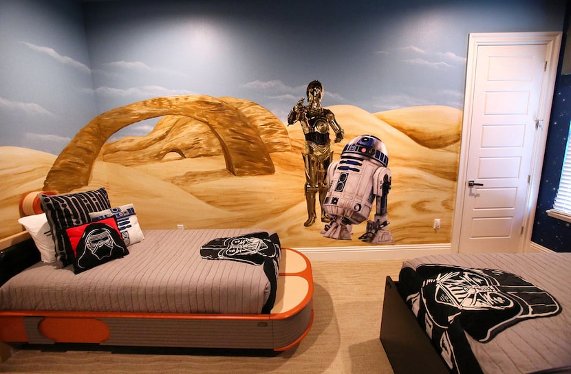 Droids adorn the wall at this Star Wars-themed vacation rental in Kissimmee, Fla. 