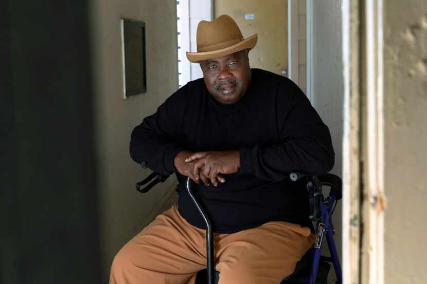 Odis Garmon, 58, poses for a portrait by his apartment in Dallas on Wednesday, November 16,...