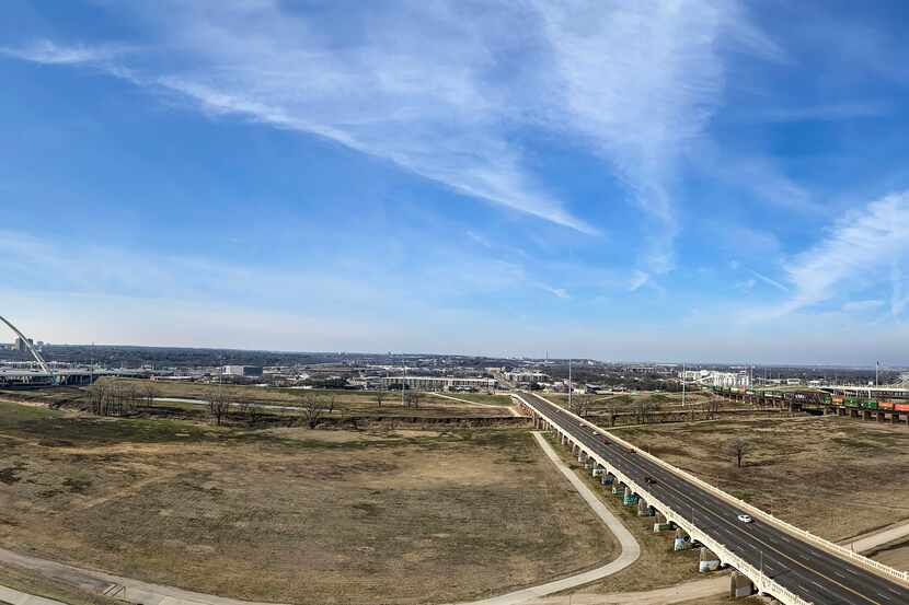 The expanse of land between the Trinity River levees that stretches from the Ron Kirk and...
