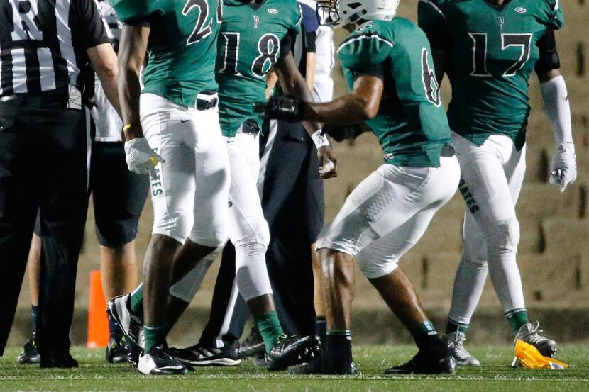 Poteet defender Mekhi Garner (28)  comes up with a fumble recovery on the goal line in the...