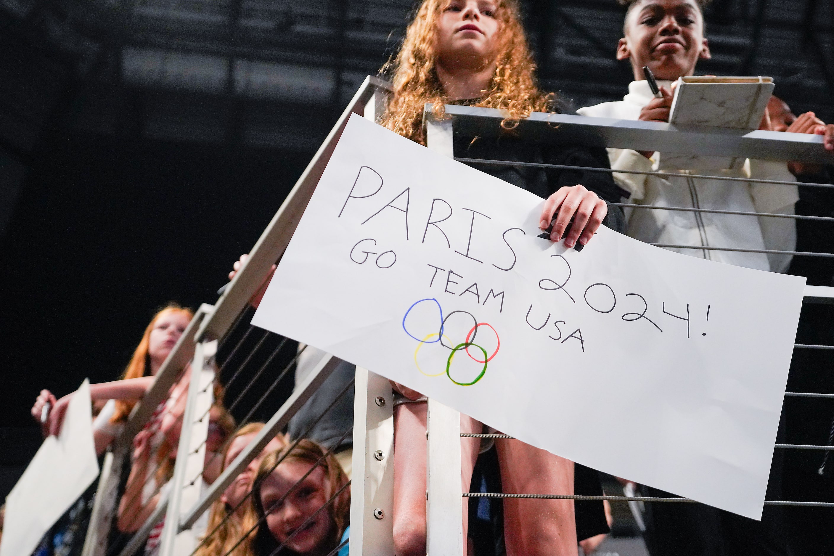 Fans look for autographs following the U.S. Gymnastics Championships on Sunday, June 2,...