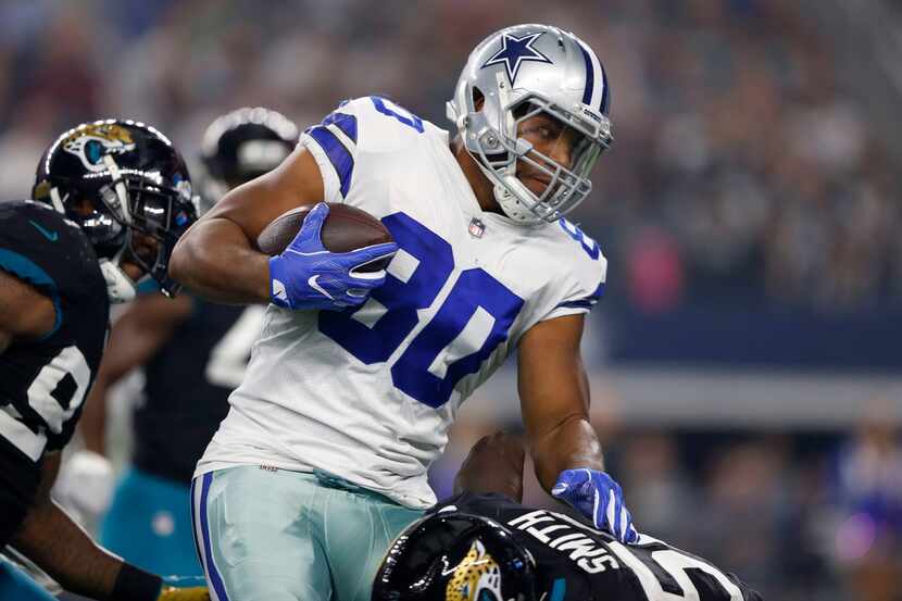Dallas Cowboys tight end Rico Gathers (80) runs up the field after the catch as Jacksonville...