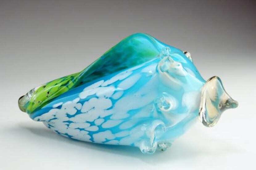 
Mouth-blown glass conch shells by Raymond Rains are each unique.
