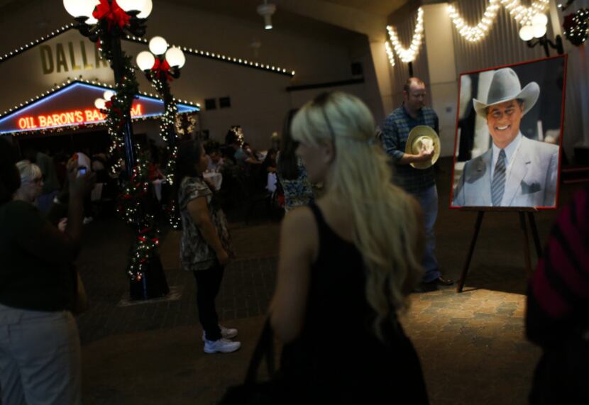 A larger than life photograph of Larry Hagman as J.R. Ewing was a fan favorite at a memorial...