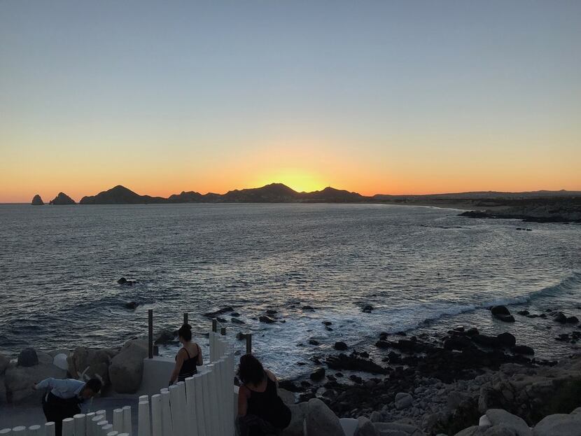 The sun sets over the beach in Cabo San Lucas, a popular destination for American tourists...