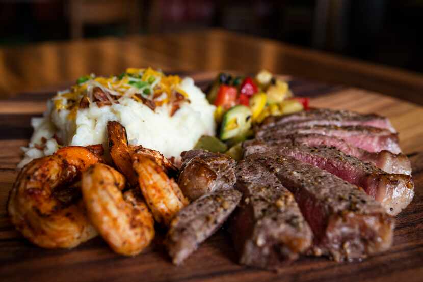 El Patio New York Strip with added grilled shrimp and served with mashed potatoes and veggies