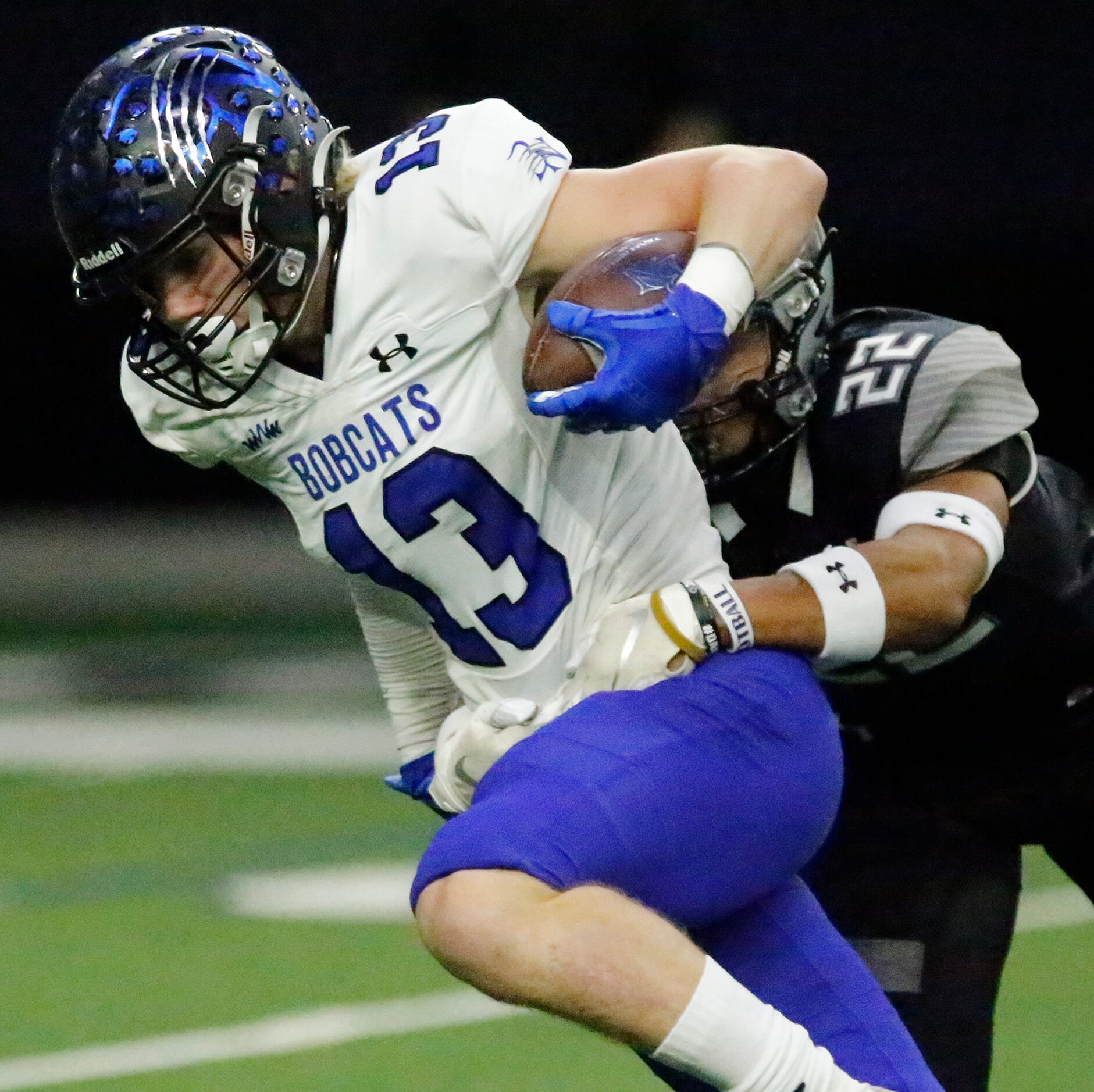 Guyer High School tight end Dylan Rivero (13) tries to break from Guyer High School free...