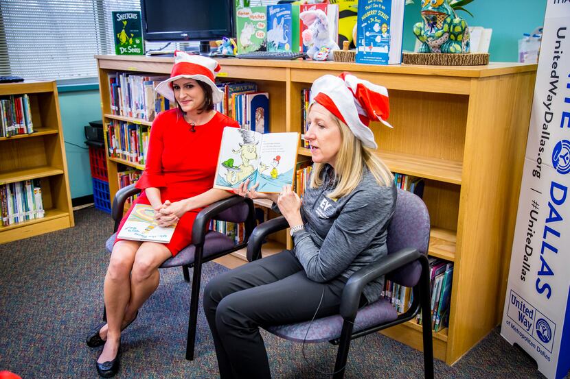 Michelle Vopni, Dallas Office managing partner at EY, reads to local students at United Way...