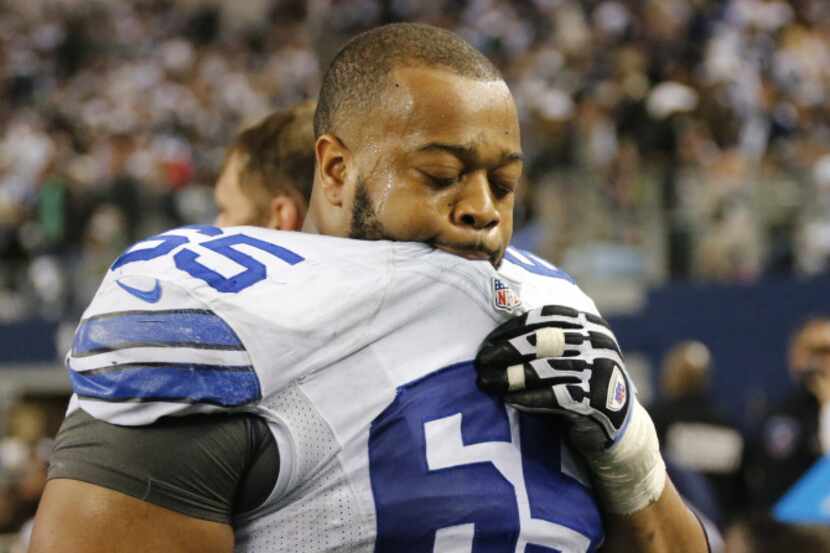 Dallas Cowboys guard Ronald Leary (65) walks off the sidelines as time runs out in Dallas'...