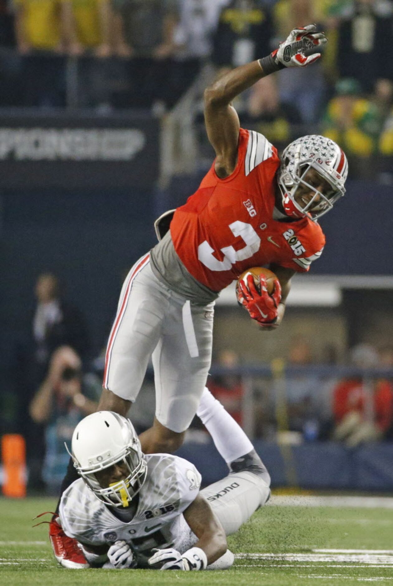 Ohio State Buckeyes wide receiver Michael Thomas (3) is tackled by defensive back Chris...