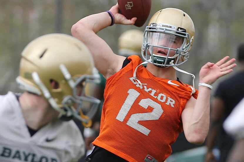 Baylor quarterbacks Charlie Brewer throws during the team's first day of spring NCAA college...