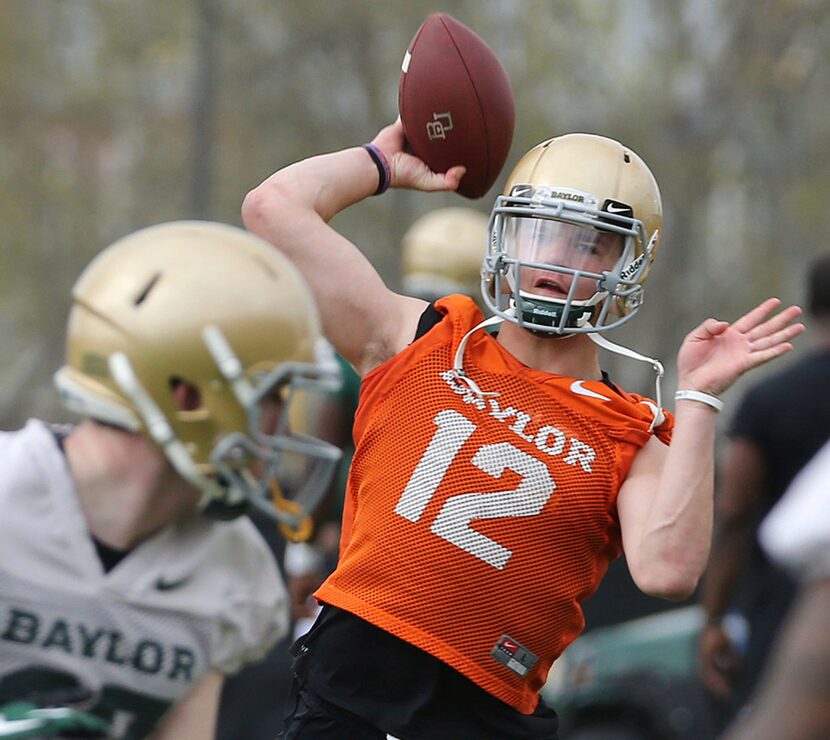 Baylor quarterbacks Charlie Brewer throws during the team's first day of spring NCAA college...