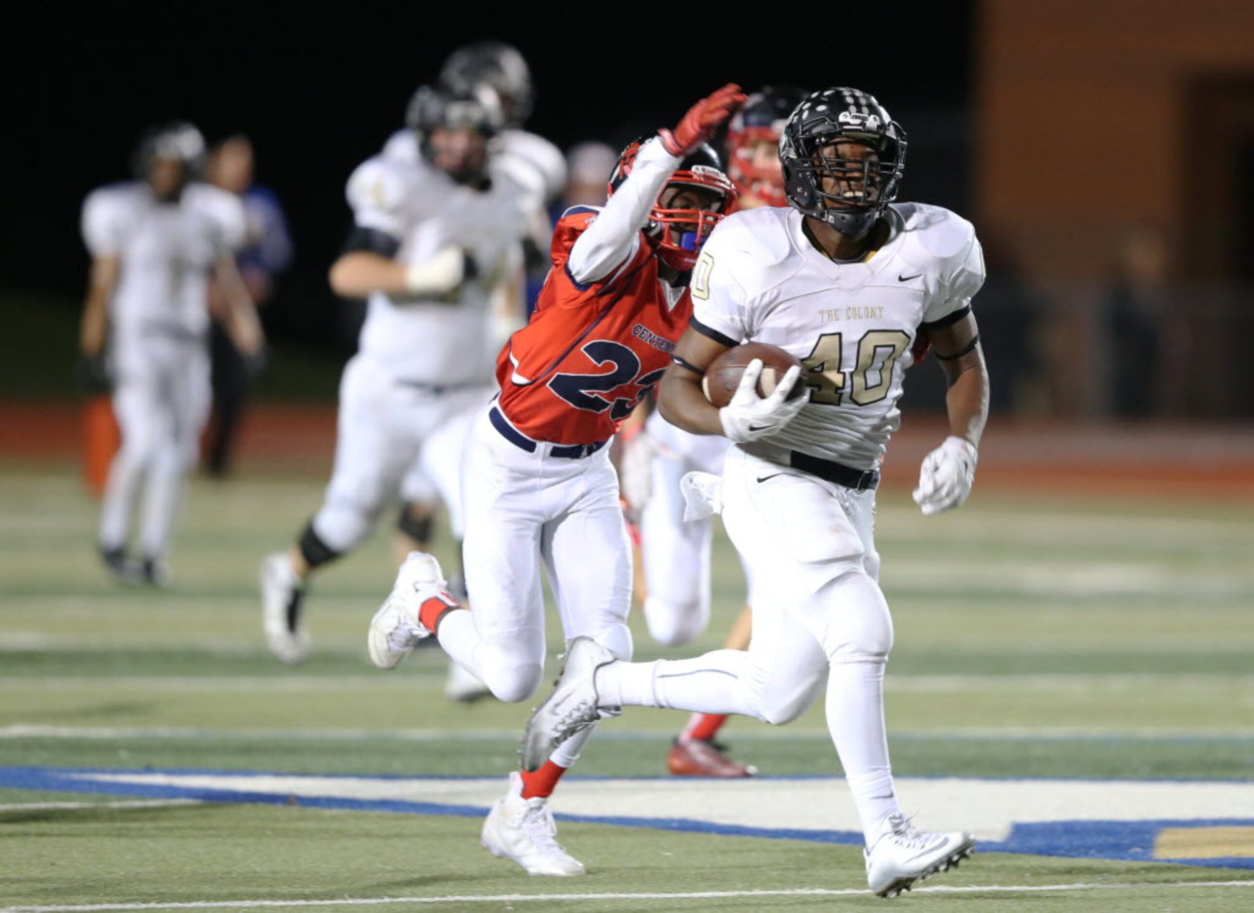 The Colony's Darius Mitchell (40) breaks away for a long run as Frisco Centennial's Jaylin...