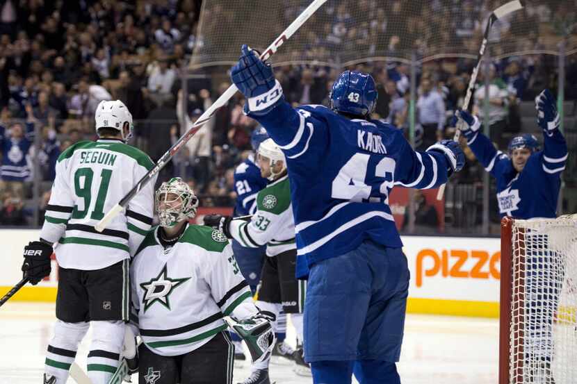 Toronto Maple Leafs center Nazem Kadri (43) celebrates his goal with teammate Phil Kessel,...