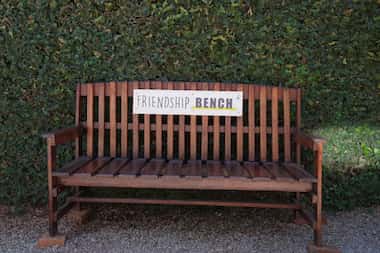 An empty bench is seen outside the Friendship Bench offices in Harare, Zimbabwe, Saturday,...