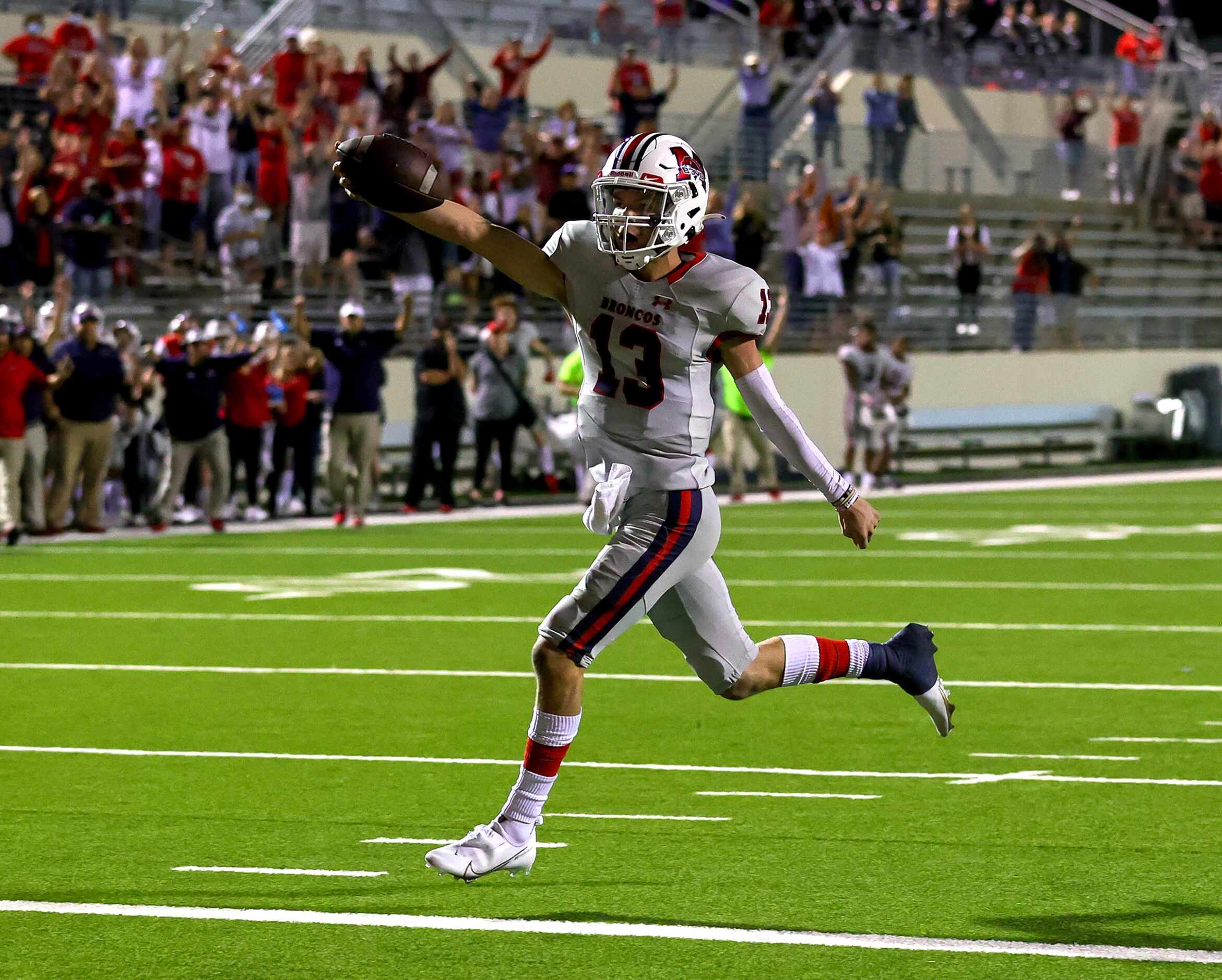 McKinney Boyd quarterback Ryan Shackleton (13) goes into the endzone for the game winning...