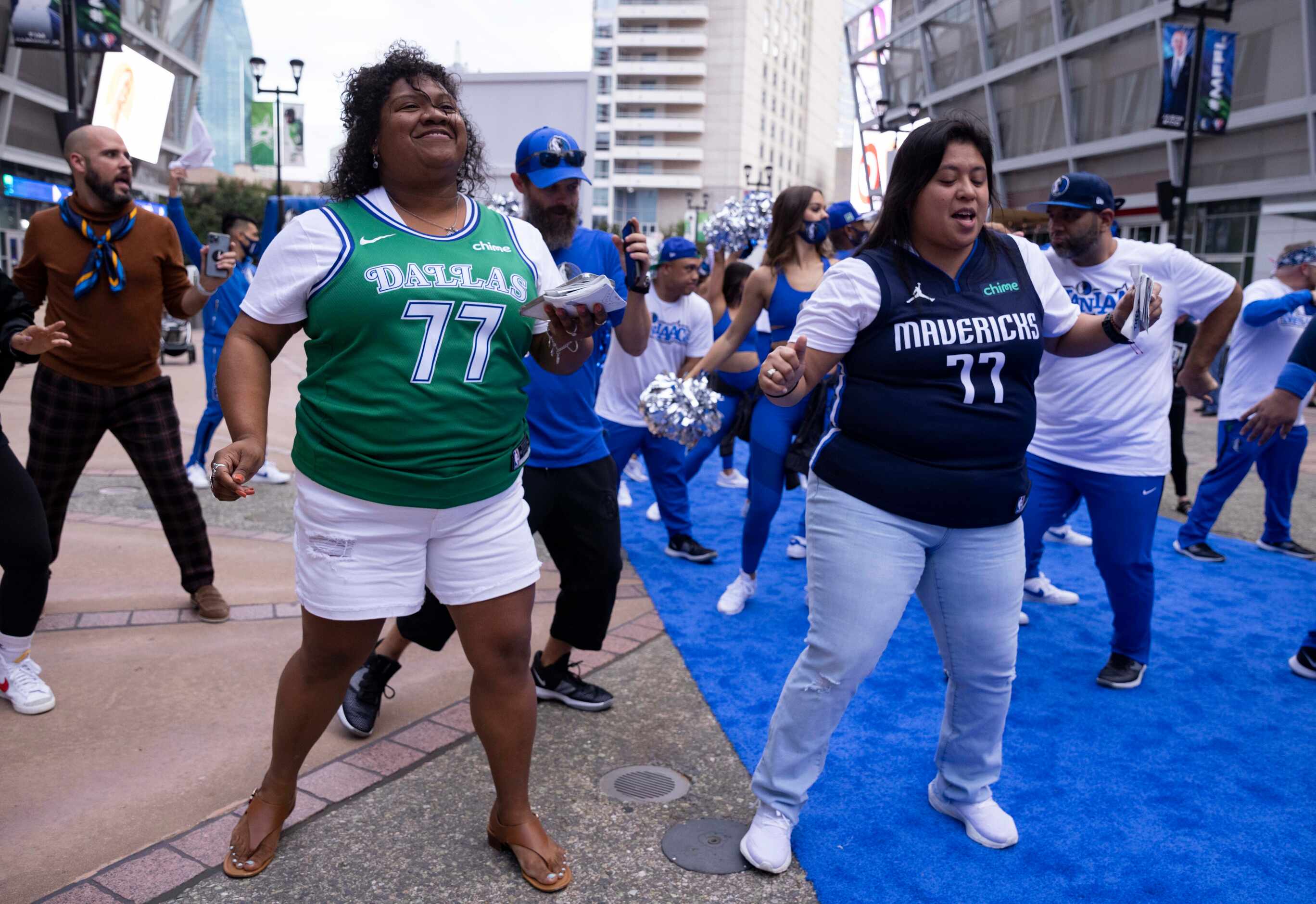 Nicole Graves (left) and Magdalena Aguilar of Waco dance before the Dallas Mavericks home...