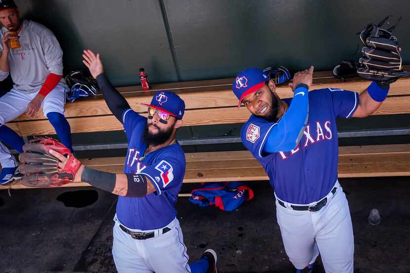 Texas Rangers second baseman Rougned Odor (left) and shortstop Elvis Andrus perform their...