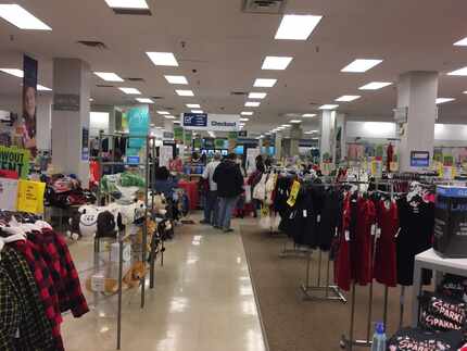 Sears shoppers at the store in Collin Creek Mall in Plano on Dec. 22.