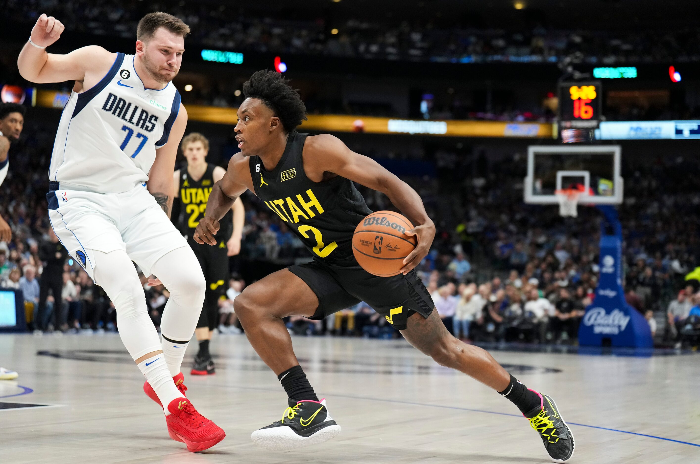 Dallas Mavericks guard Luka Doncic (77) defends against Utah Jazz guard Collin Sexton (2)...