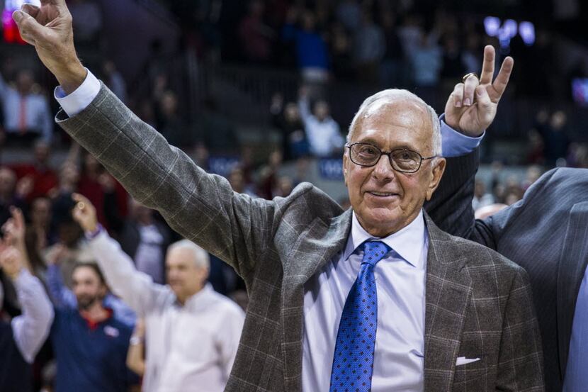 Southern Methodist Mustangs head coach Larry Brown celebrates a 59-57 win over the...