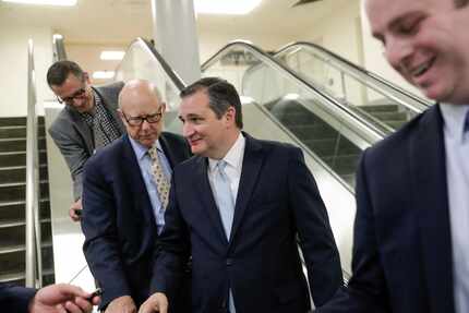 Sen. Ted Cruz, R-Texas, joined by Sen. Pat Roberts, R-Kan., spoke with reporters after...