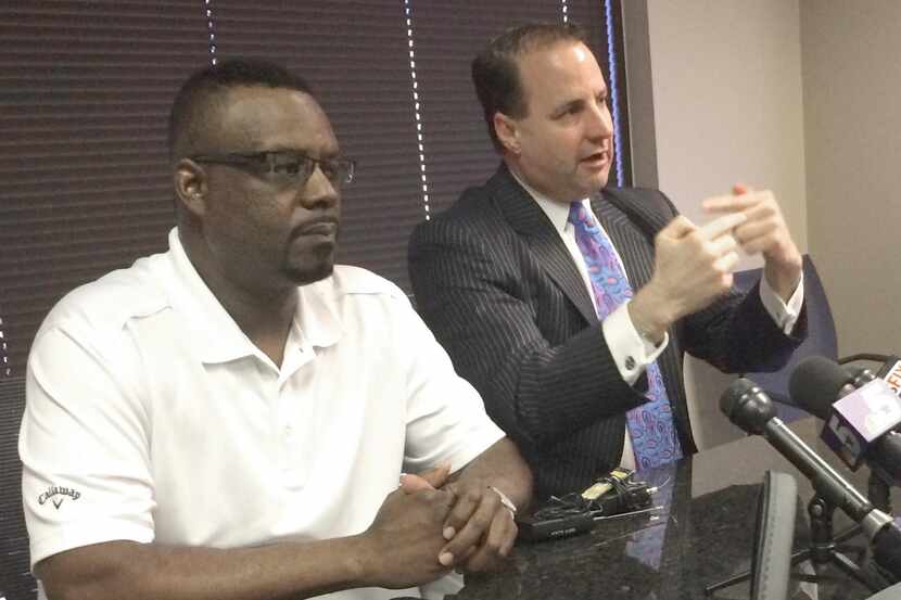 
Sean Harrison (left), the older brother of Jason Harrison, and Geoff Henley, the lawyer for...
