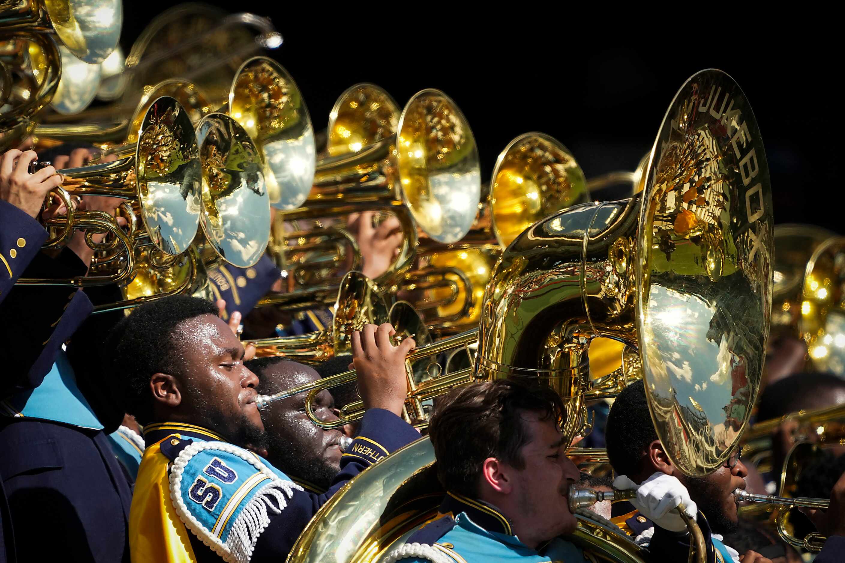 Members of the Southern Human Jukebox marching band perform during the first half of an NCAA...