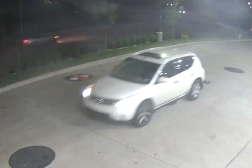 The suspects' vehicle is a white SUV, possibly a Nissan Murano, without a front license plate.