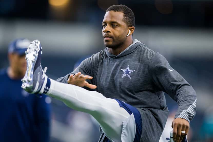 Dallas Cowboys wide receiver Randall Cobb (18) warms up before an NFL game between the Miami...
