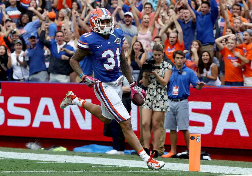 GAINESVILLE, FL - OCTOBER 15: Teez Tabor #31 of the Florida Gators crosses the goal line for...