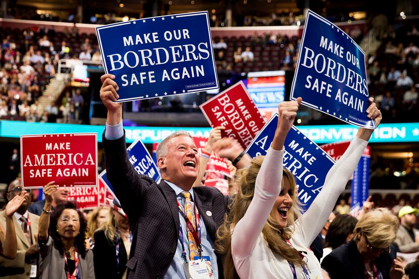 California delegates cheer a speech by U.S. Rep. Michael McCaul of Texas during the second...