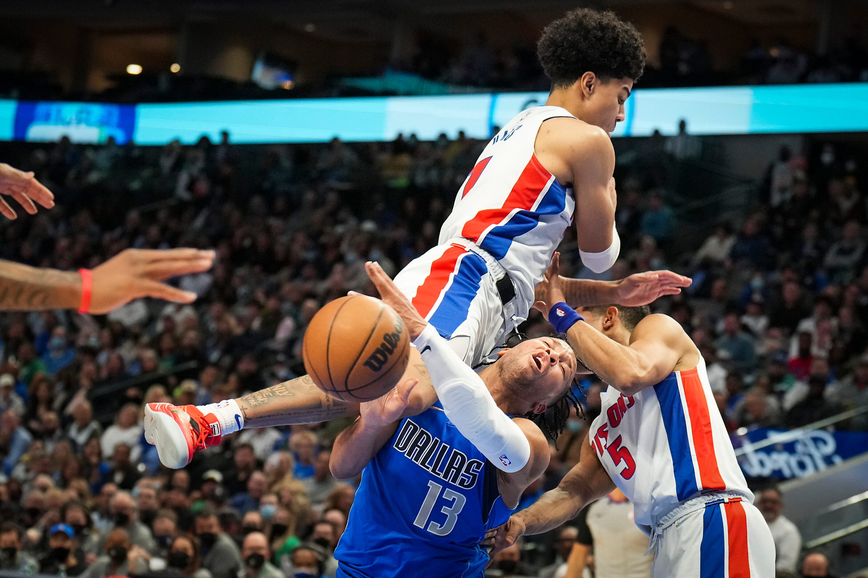 Dallas Mavericks guard Jalen Brunson (13) is fouled by Detroit Pistons guard Killian Hayes...