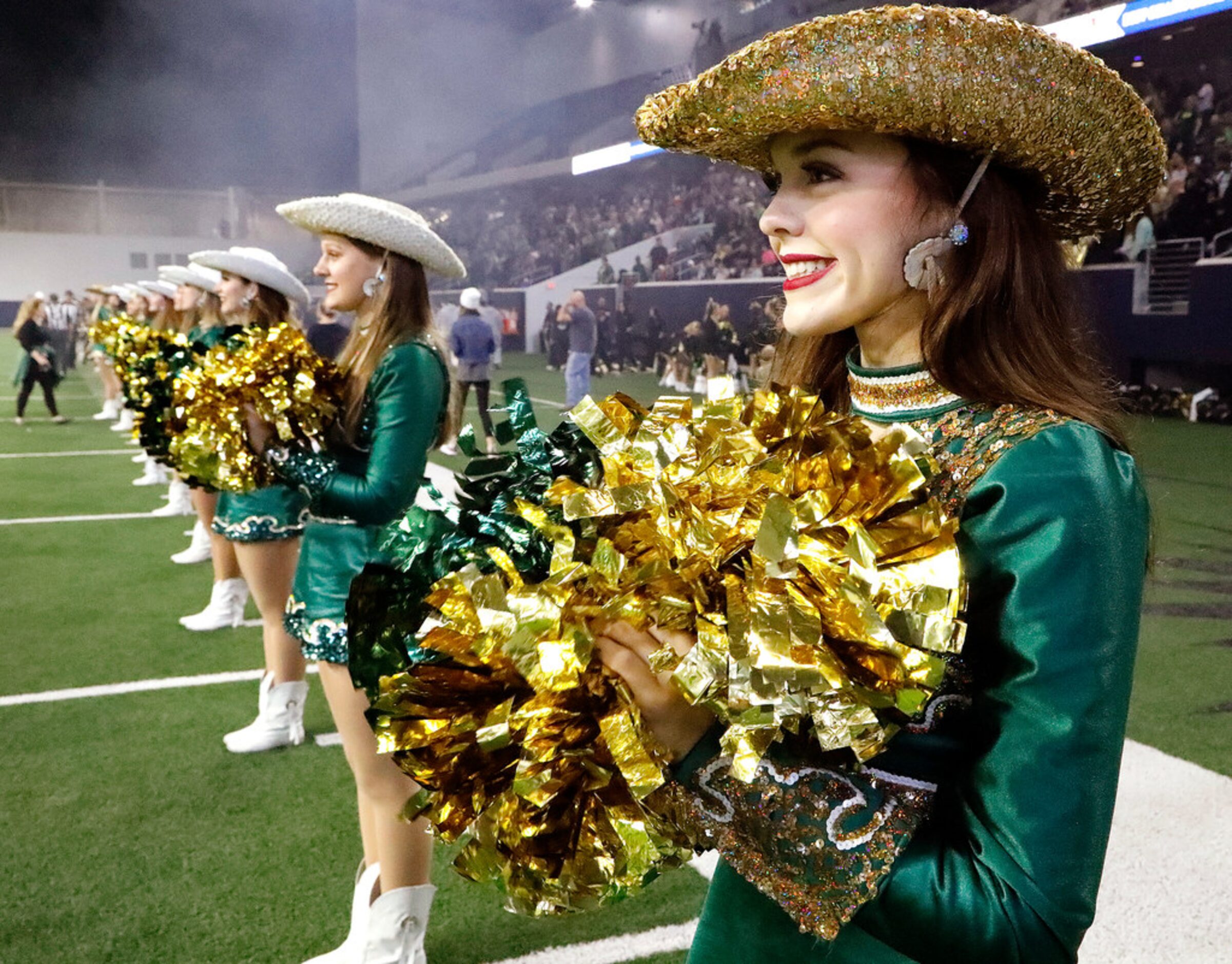 Annah Lee, 16, with the Golden Motion danc team from Birdville High School, stands at...