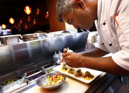 Chef Vijay Sadhu, photographed here at Pepper Smash in Plano in 2019, went on to be the...