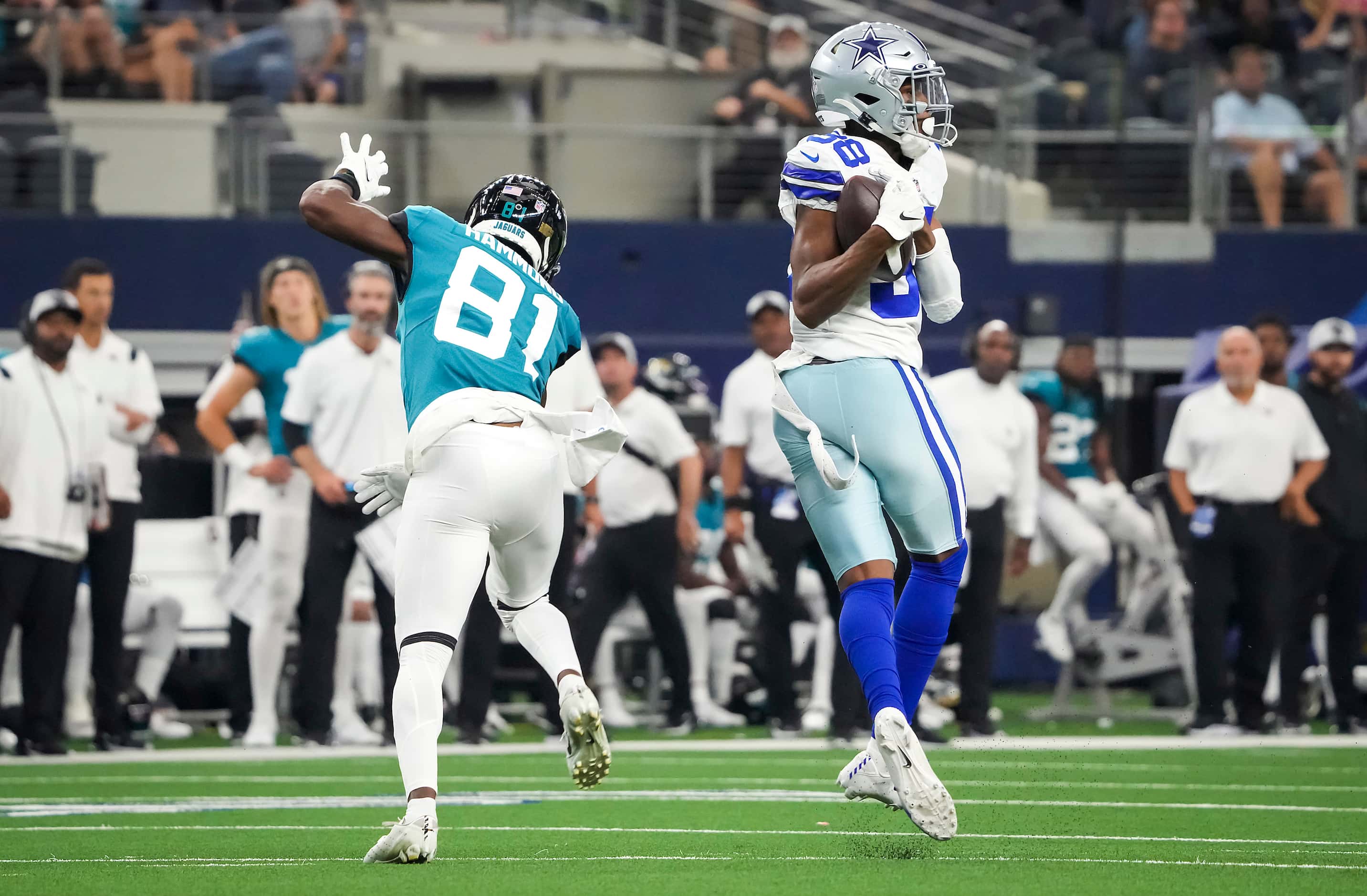 Dallas Cowboys cornerback Israel Mukuamu (38) intercepts a pass intended for Jacksonville...