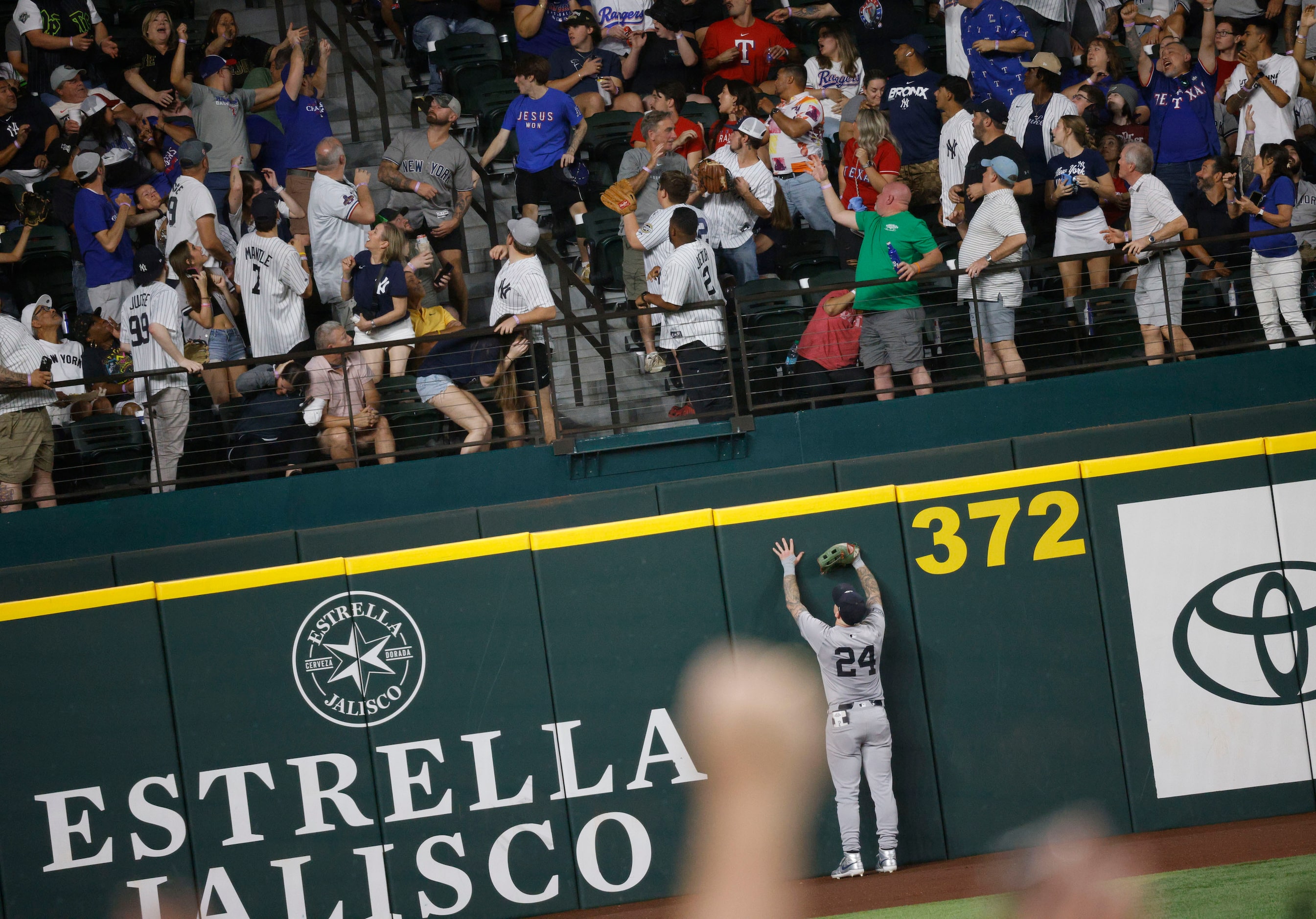 New York Yankees outfielder Alex Verdugo (24) looks up Texas Rangers Wyatt Langford’s...