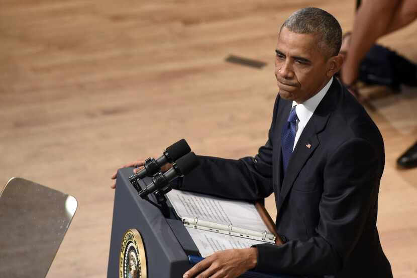 President Barack Obama speaks an interfaith memorial service for the fallen police officers...