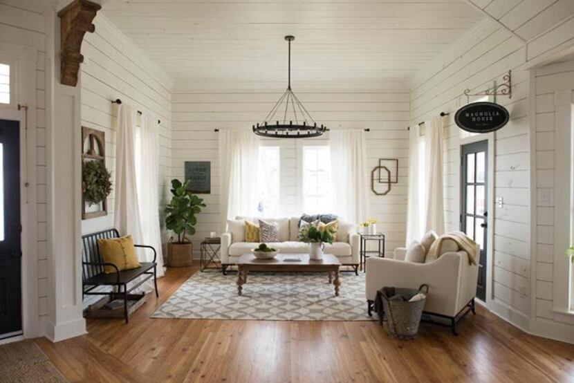 
Above: Joanna Gaines, co-host of HGTV’s Fixer Upper, used white walls in the living room at...