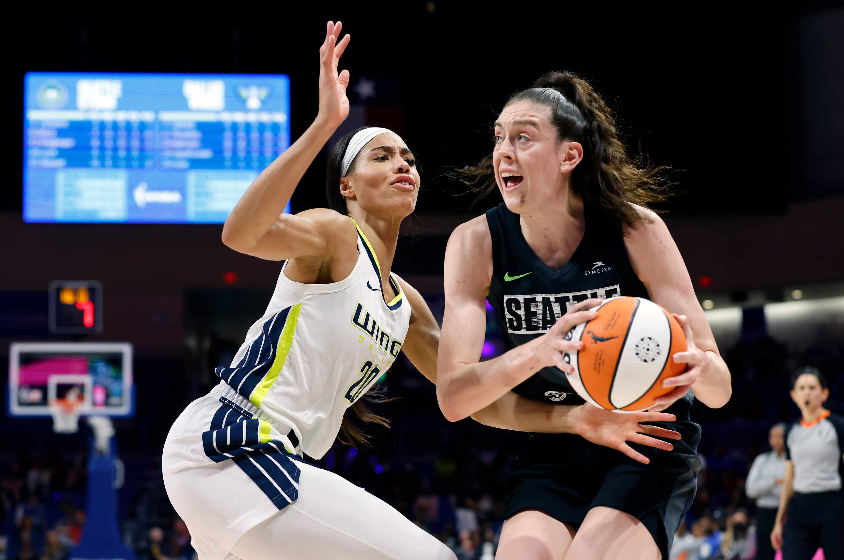Seattle Storm forward Breanna Stewart (30) looks to the basket as he’s covered by Dallas...