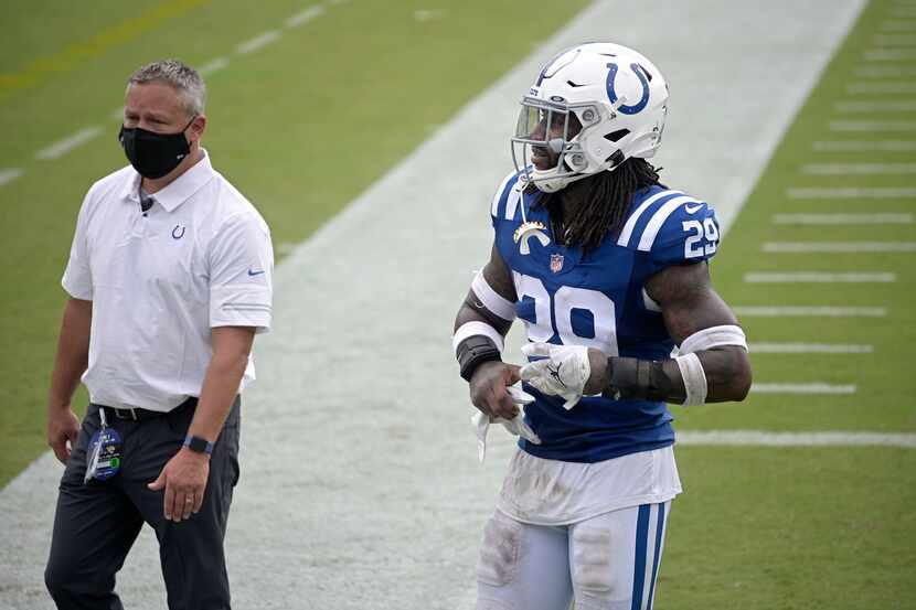 Indianapolis Colts free safety Malik Hooker (29) walks off the field after an NFL football...