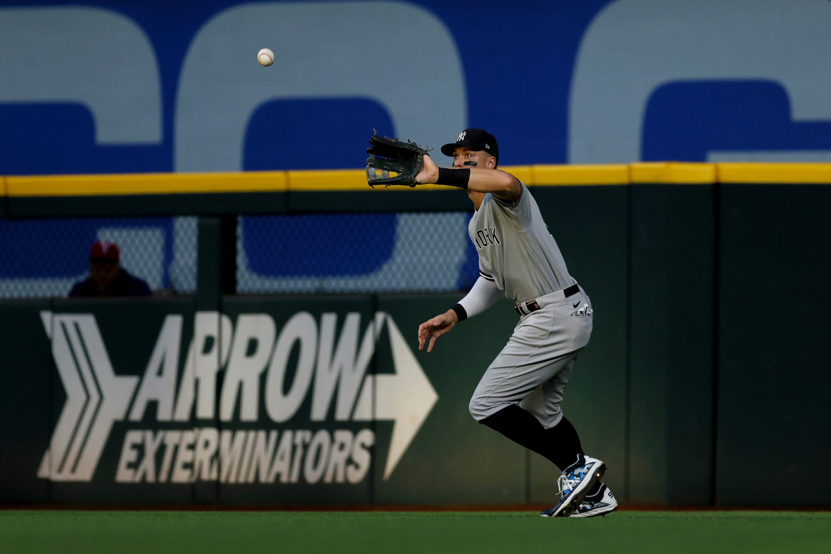 New York Yankees right fielder Aaron Judge (99) makes a catch for an out during the second...