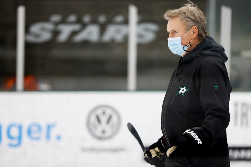 Dallas Stars head coach Rick Bowness watches his team workout during a training camp...