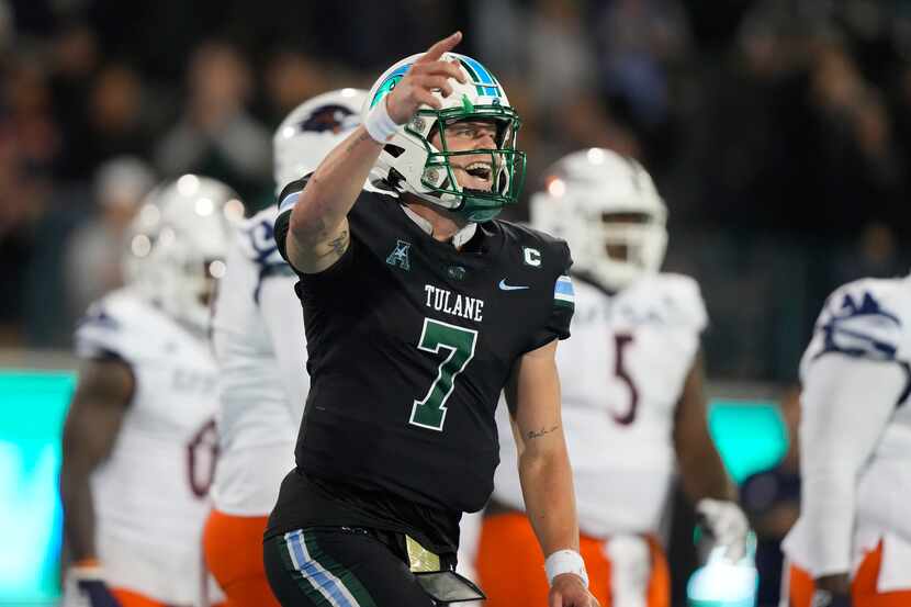 Tulane quarterback Michael Pratt (7) celebrates his touchdown pass in the second half of an...