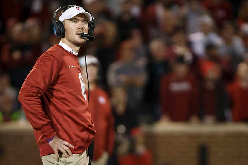 Oklahoma head coach Lincoln Riley looks up at the scoreboard during the second half of an...