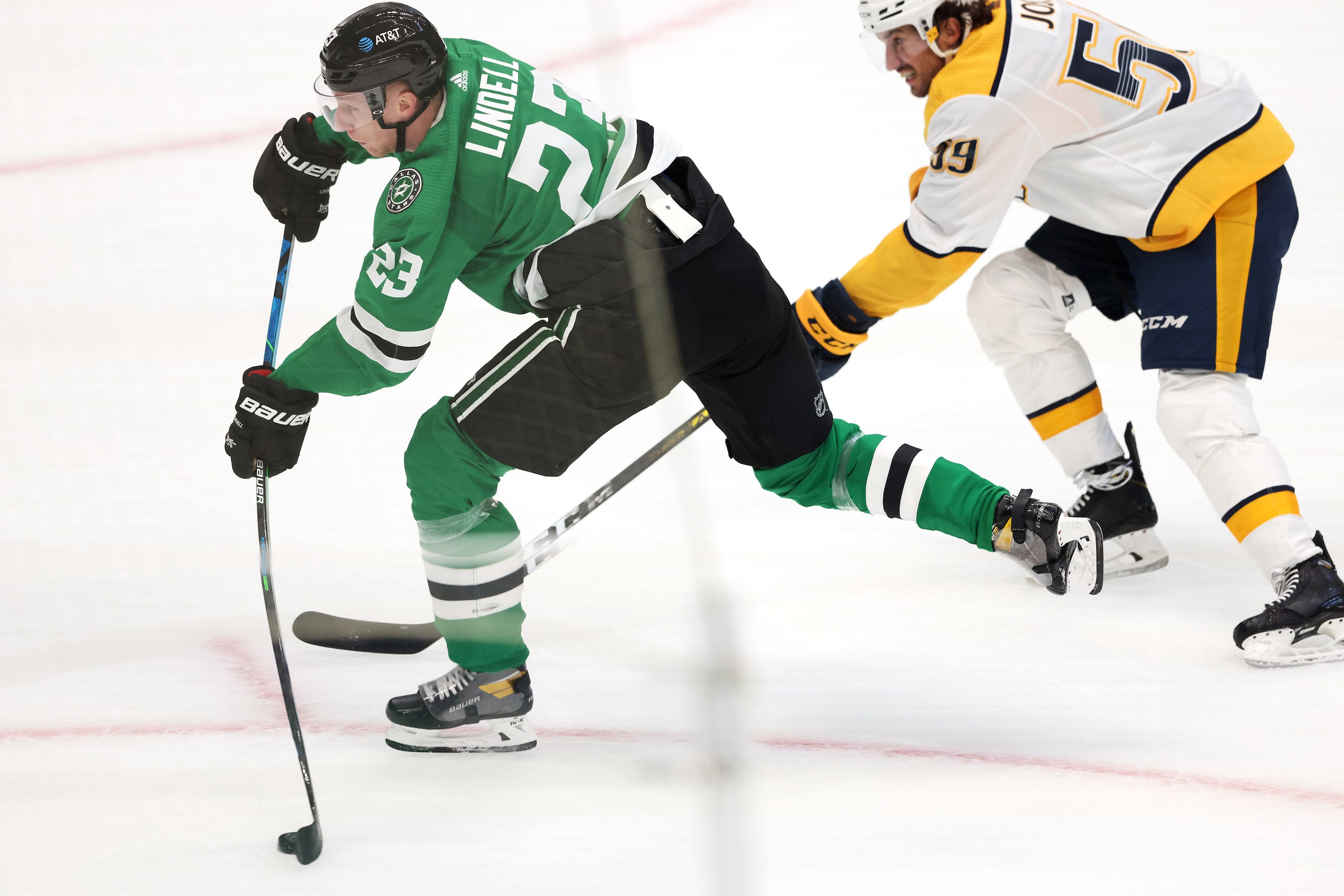 Dallas Stars defenseman Esa Lindell (23) shoots and scores a goal as Nashville Predators...