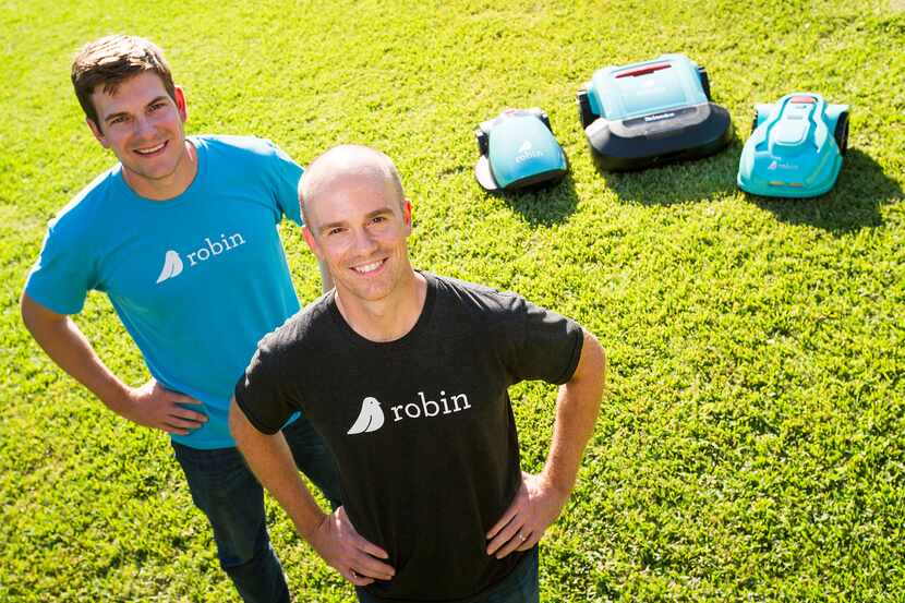 Robin cofounders Bart Lomont (left) and Justin Crandall with a few of their roomba-like...